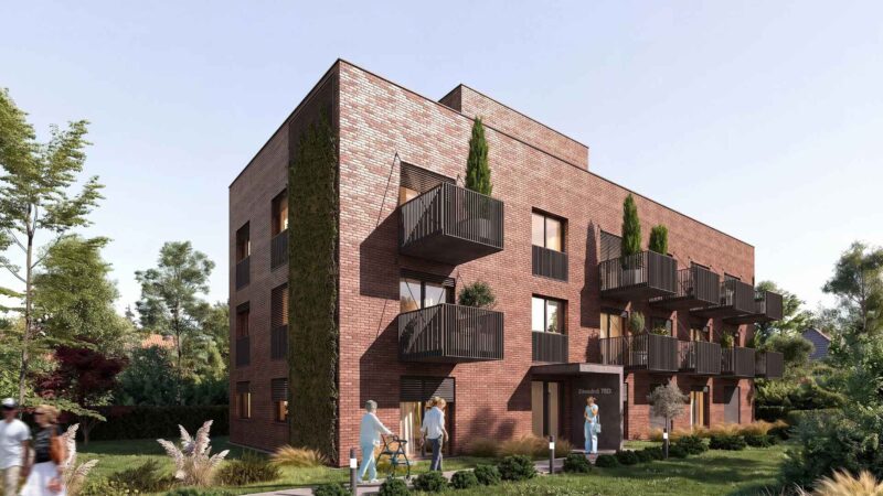 Investičný projekt Komunita Malý Dunaj – vizualizácia bytového domu s balkónmi a zeleňou v Podunajských Biskupiciach